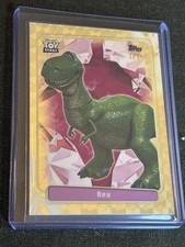 Marketplace image: Topps 30 Years Of Toy Story Rex Toy Taaffeite Superfractor 1/1  Case Hit