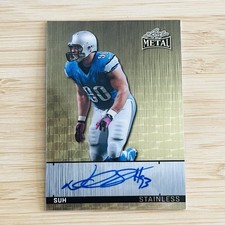 Marketplace image: NDAMUKONG SUH 2026 Leaf Metal Stainless Superfractor Prizm Auto Autograph 1/1