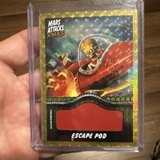 Marketplace image: 2026 Topps Mars Attacks Xmas Invasion Worn Relics Superfractor 1/1 Escape Pod