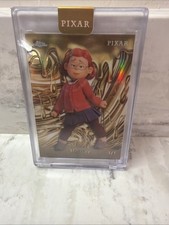 Marketplace image: 2025 Topps Chrome Pixar Mei Lee Dipped in Gold Superfractor 1/1