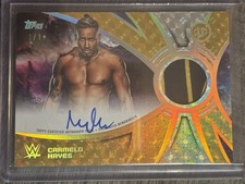 Marketplace image: 2026 Topps WWE Universe Carmelo Hayes Foilfractor Superfractor Relic Auto 1/1 SP