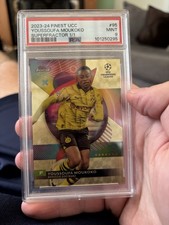 Current marketplace image for 2023 Topps Finest UCC #95 Youssoufa Moukoko Superfractor 1/1